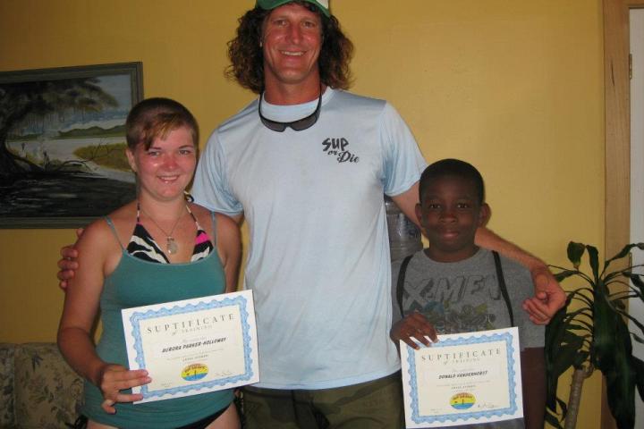 two kids with an instructor