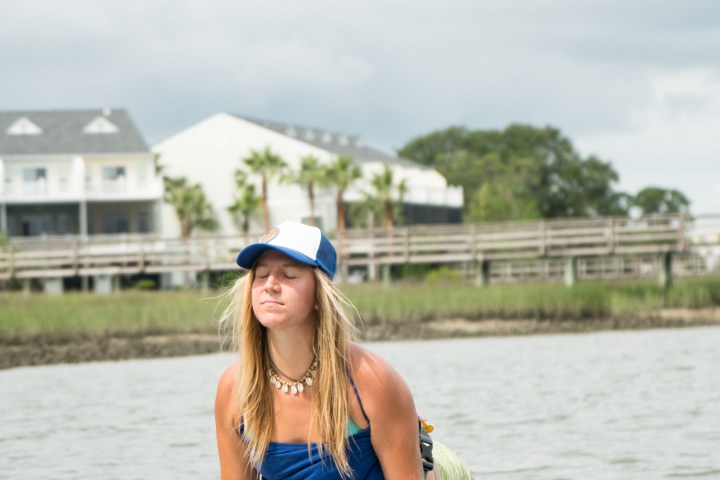 yoga woman on paddle board