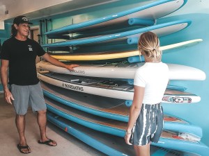 a person standing in front of a boat
